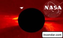 UFO sighting NASA films largest UFO ever recorded exiting Sun